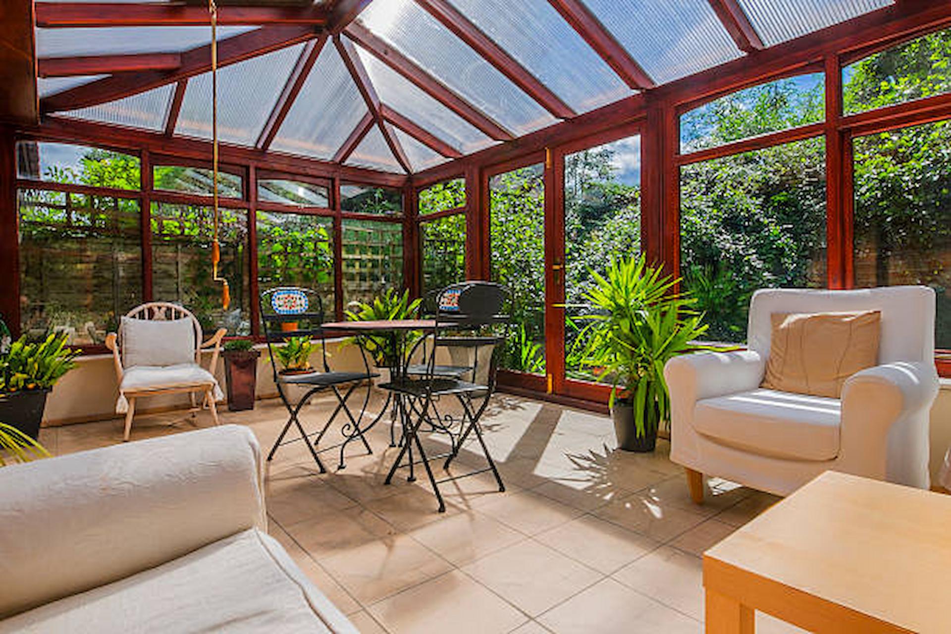 Stunning wooden conservatories to compliment any home from the exerts at Chartwell Wooden Windows.